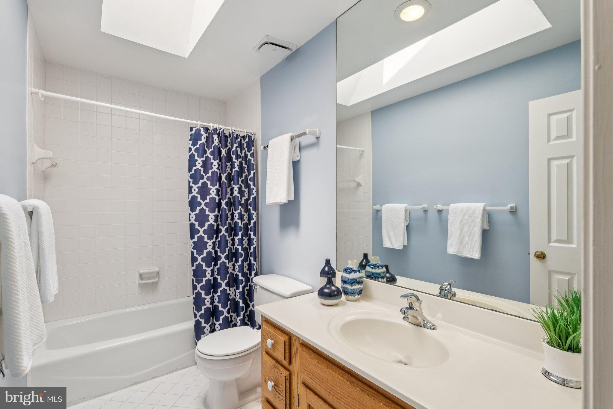 15313 Watergate Road Silver Spring, MD 20905 - Photo 24 of 53 a bathroom with a sink toilet and shower