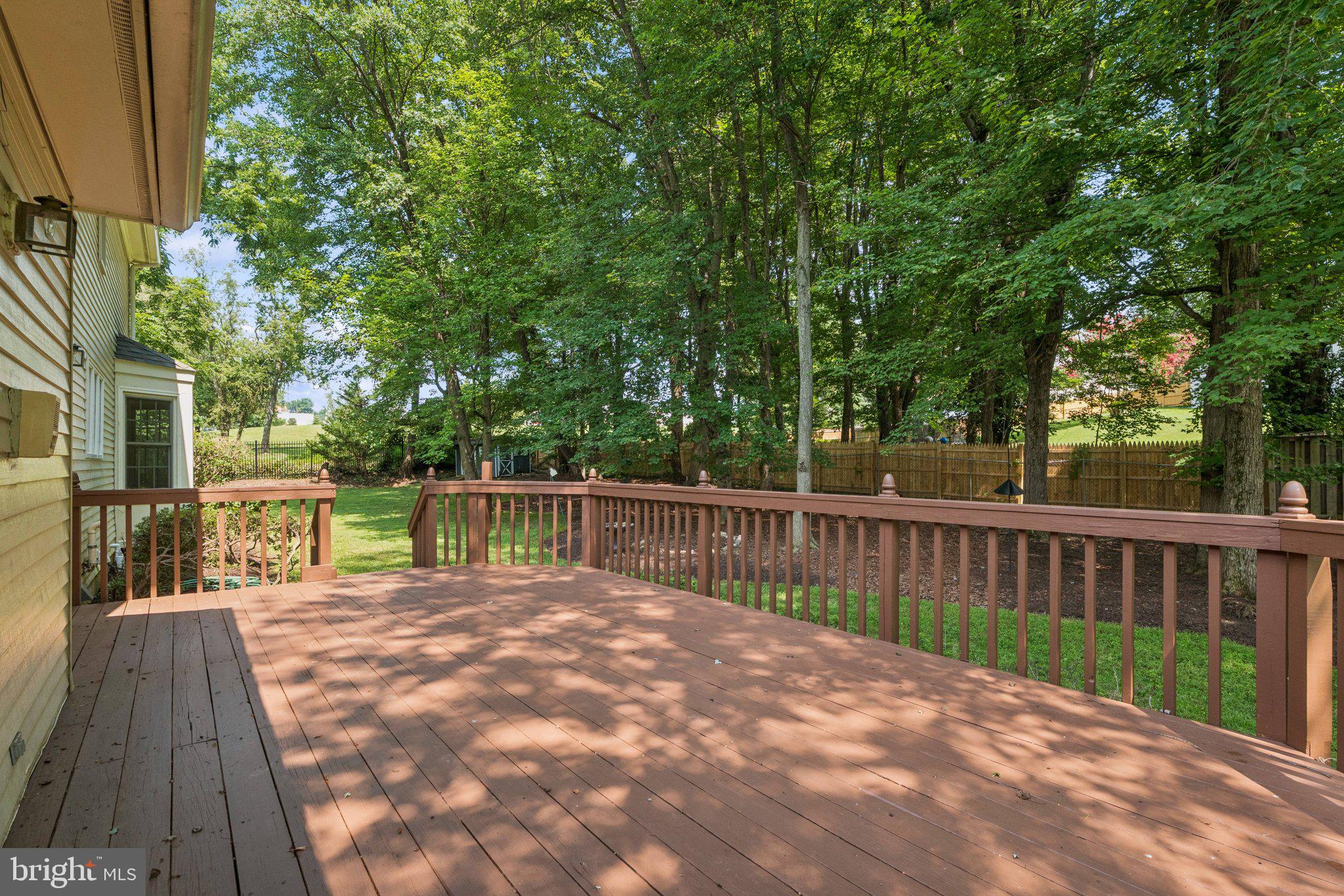 15313 Watergate Road Silver Spring, MD 20905 - Photo 30 of 53 a view of balcony with deck and trees