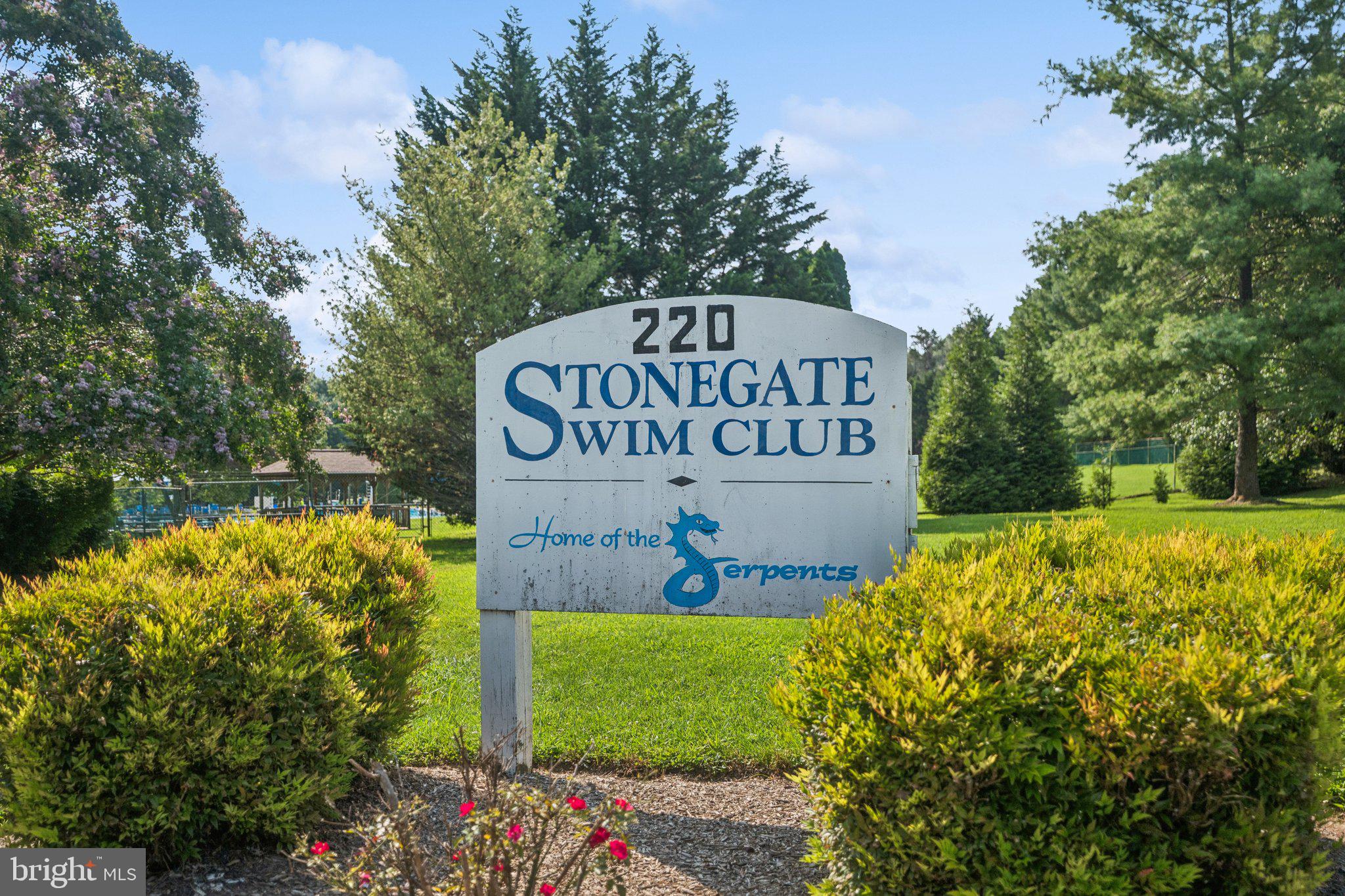 15313 Watergate Road Silver Spring, MD 20905 - Photo 32 of 53 a sign that is sitting on a brick wall