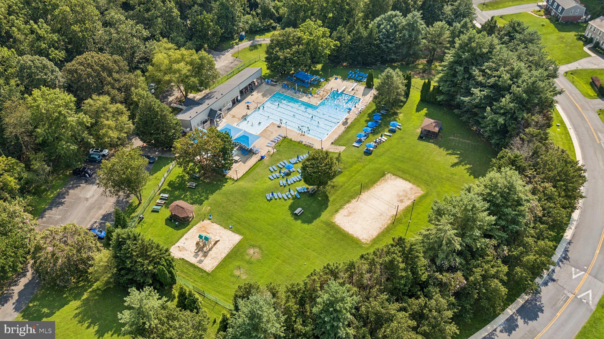 15313 Watergate Road Silver Spring, MD 20905 - Photo 33 of 53 an aerial view of a house with a yard and garden