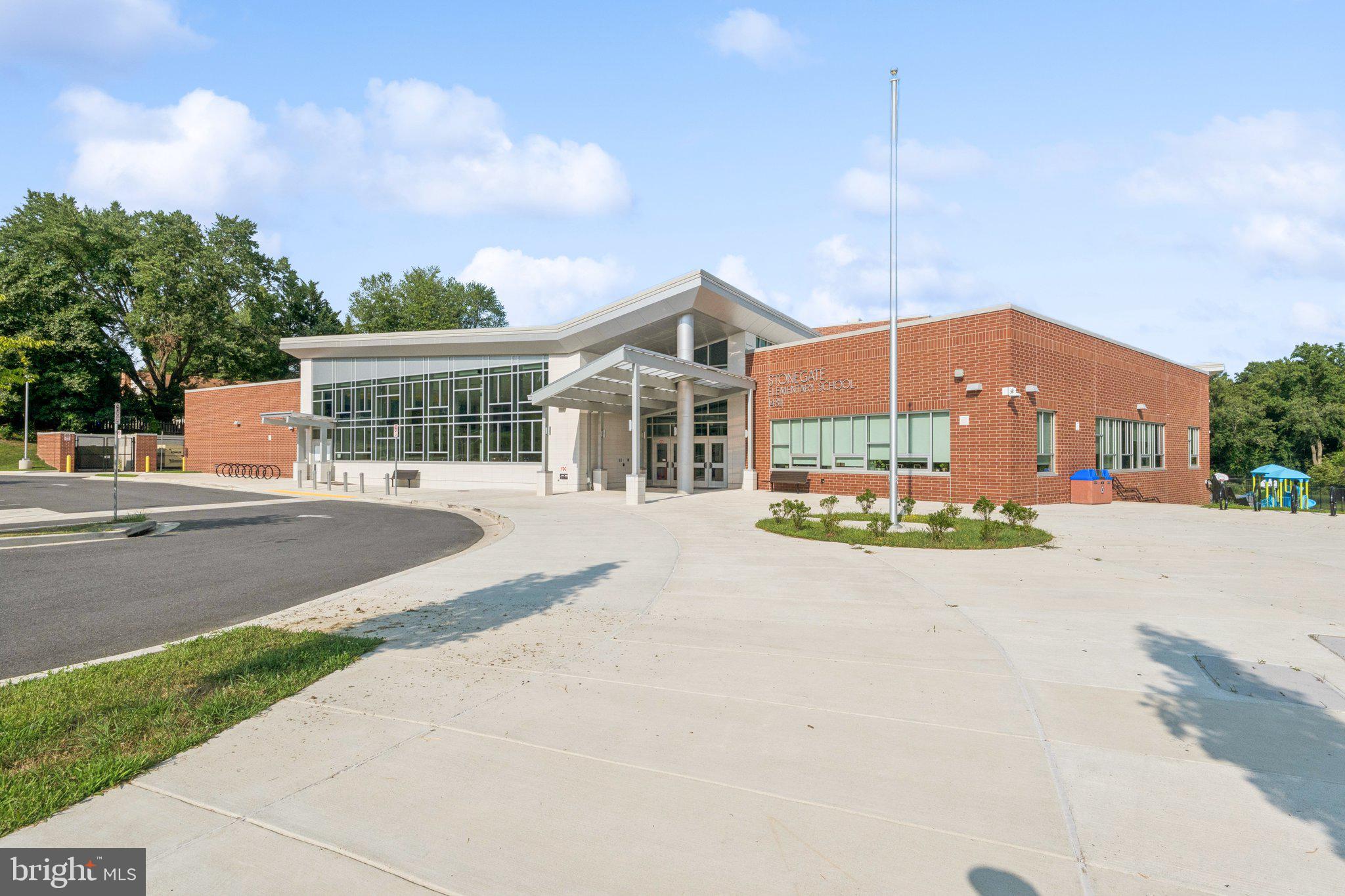 15313 Watergate Road Silver Spring, MD 20905 - Photo 39 of 53 a front view of a house with a yard