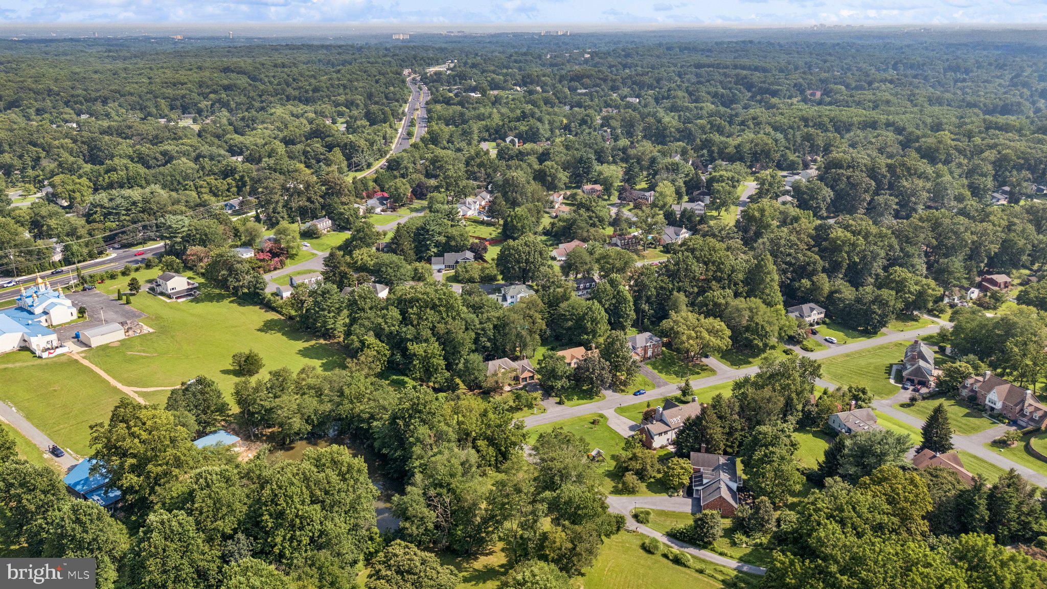 15313 Watergate Road Silver Spring, MD 20905 - Photo 49 of 53 an aerial view of residential houses with outdoor space and trees