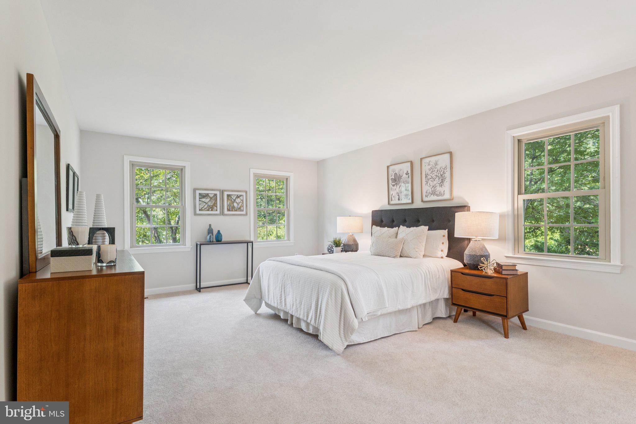 15313 Watergate Road Silver Spring, MD 20905 - Photo 7 of 53 a bedroom with a bed and a couch