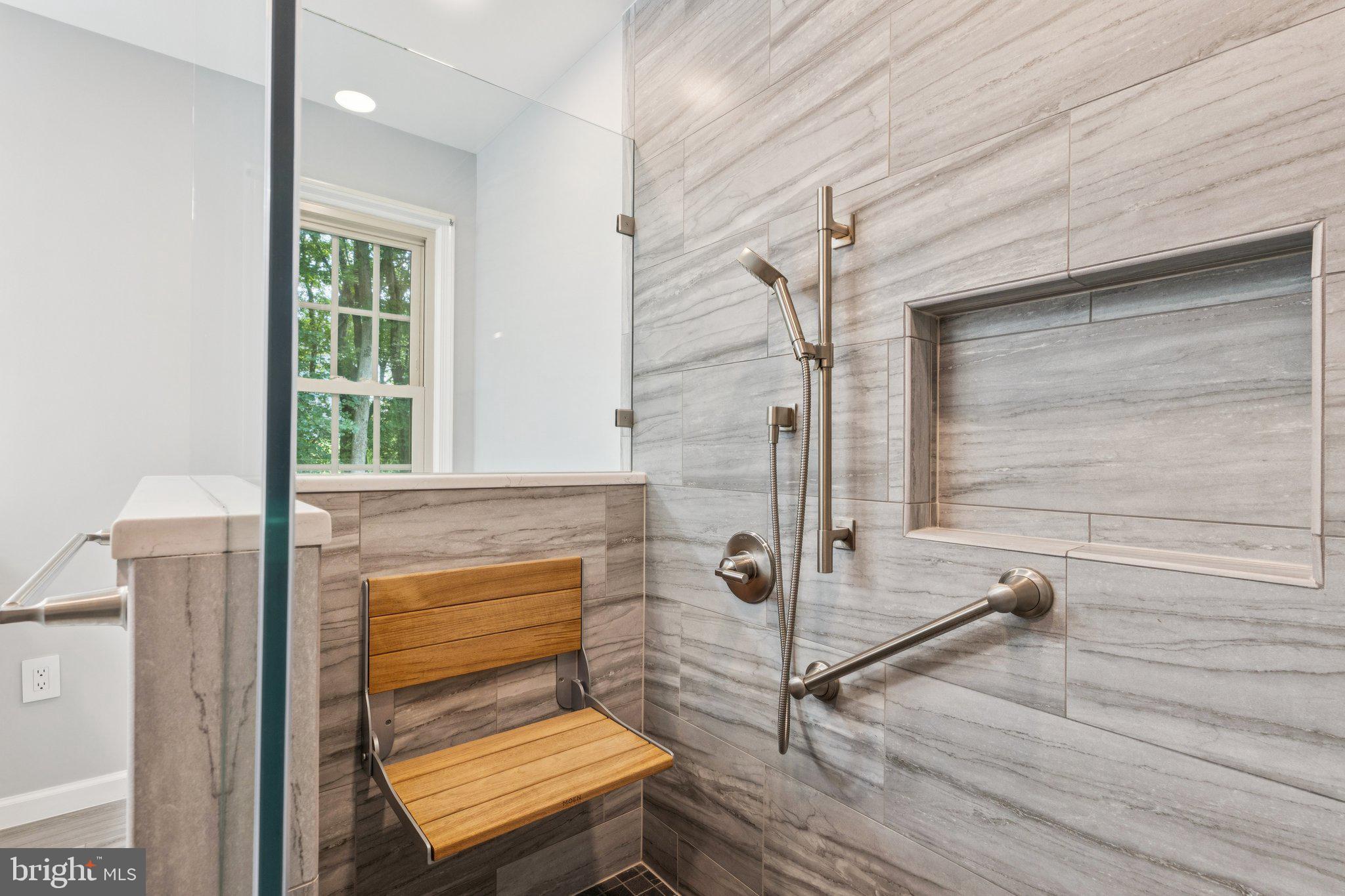 15313 Watergate Road Silver Spring, MD 20905 - Photo 9 of 53 a view of a hallway with wooden floor and staircase