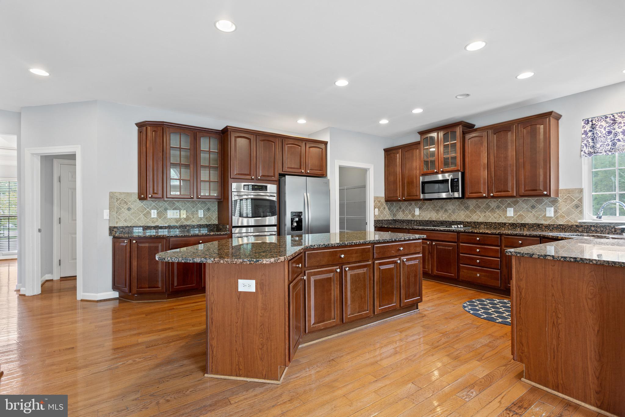 1612 Durham Way Hanover, MD 21076 - Photo 15 of 61 42" Wood cabinets & tile backsplash