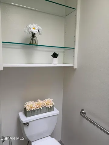 a bathroom with a toilet