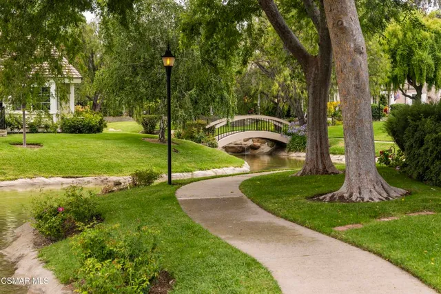 a garden view with a seating space