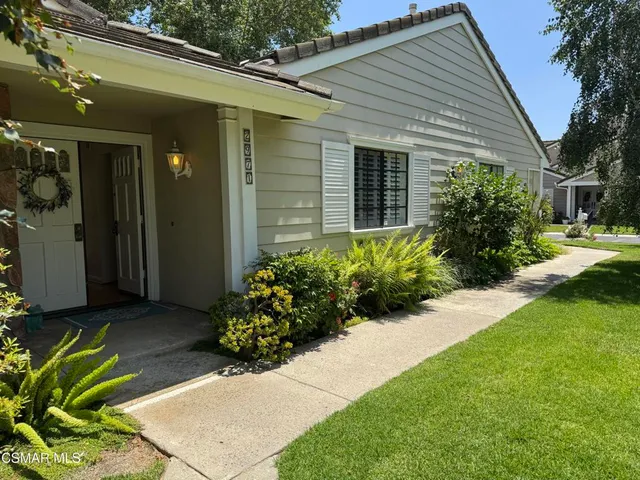 a view of a backyard with plants
