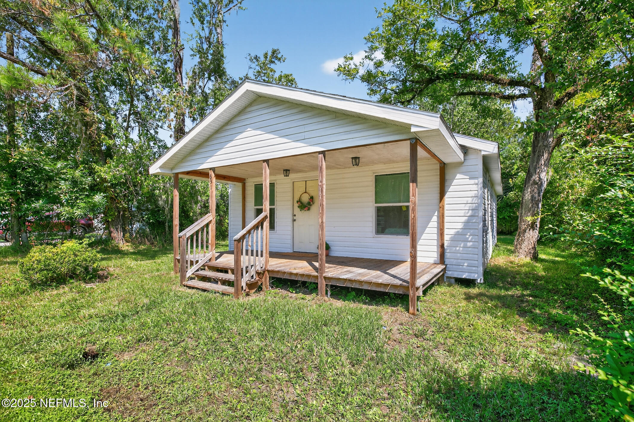 631 Moore Street Baldwin, FL 32234 - Photo 3 of 36 a view of a house with a yard