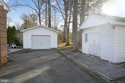 a house with a yard and garage