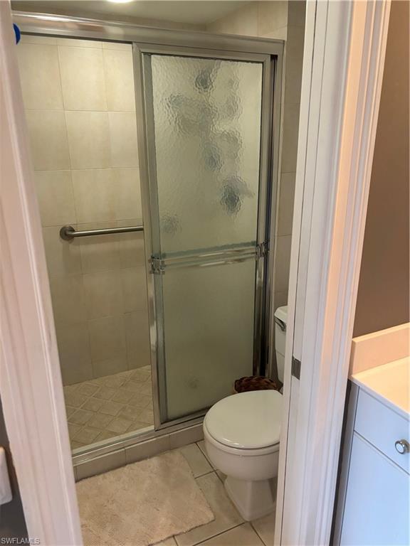 1021 3rd Street South, Unit 200 Naples, FL 34102 - Photo 21 of 26 a bathroom with a shower and a toilet