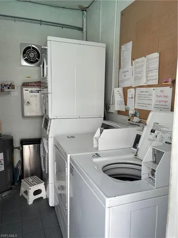 a kitchen with cabinets and window