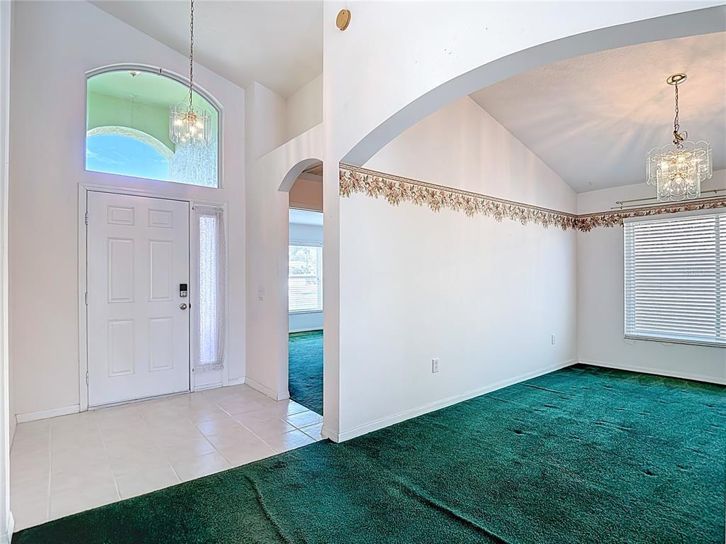 4824 Woodmere Road Land O Lakes, FL 34639 - Photo 16 of 50 a view of an empty room with a window