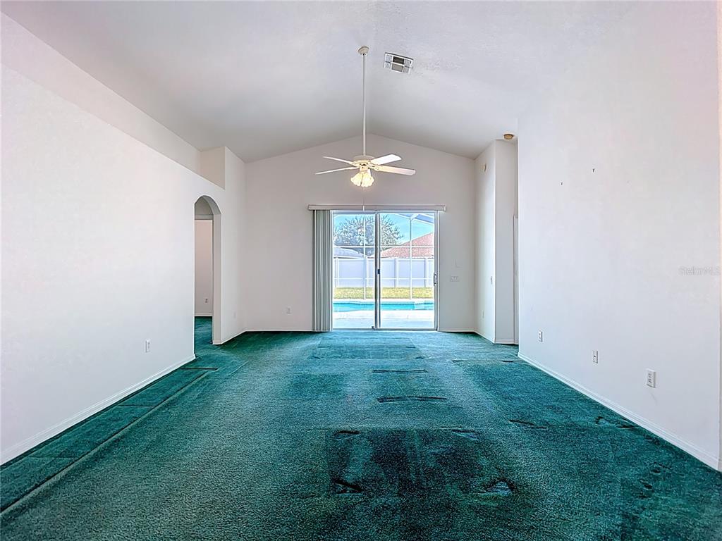 4824 Woodmere Road Land O Lakes, FL 34639 - Photo 21 of 50 a view of an empty room with window