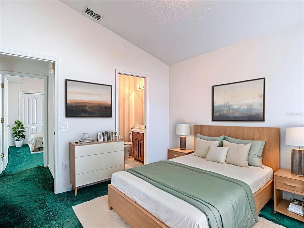 4824 Woodmere Road Land O Lakes, FL 34639 - Photo 29 of 50 a bedroom with bed and window