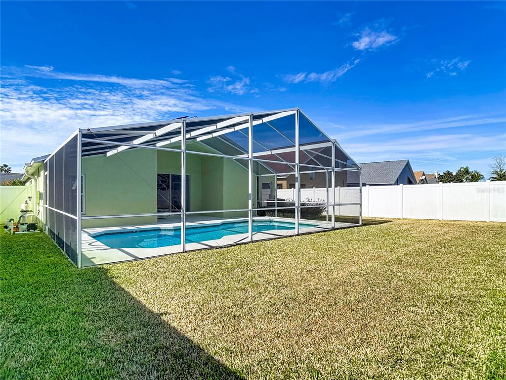 4824 Woodmere Road Land O Lakes, FL 34639 - Photo 39 of 50 a view of a backyard