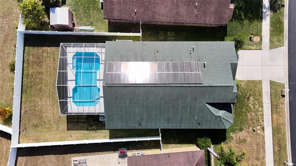 4824 Woodmere Road Land O Lakes, FL 34639 - Photo 41 of 50 an aerial view of residential houses with outdoor space