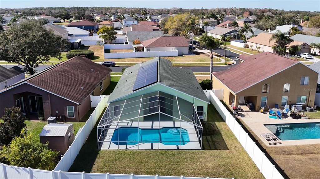 4824 Woodmere Road Land O Lakes, FL 34639 - Photo 42 of 50 an aerial view of a house