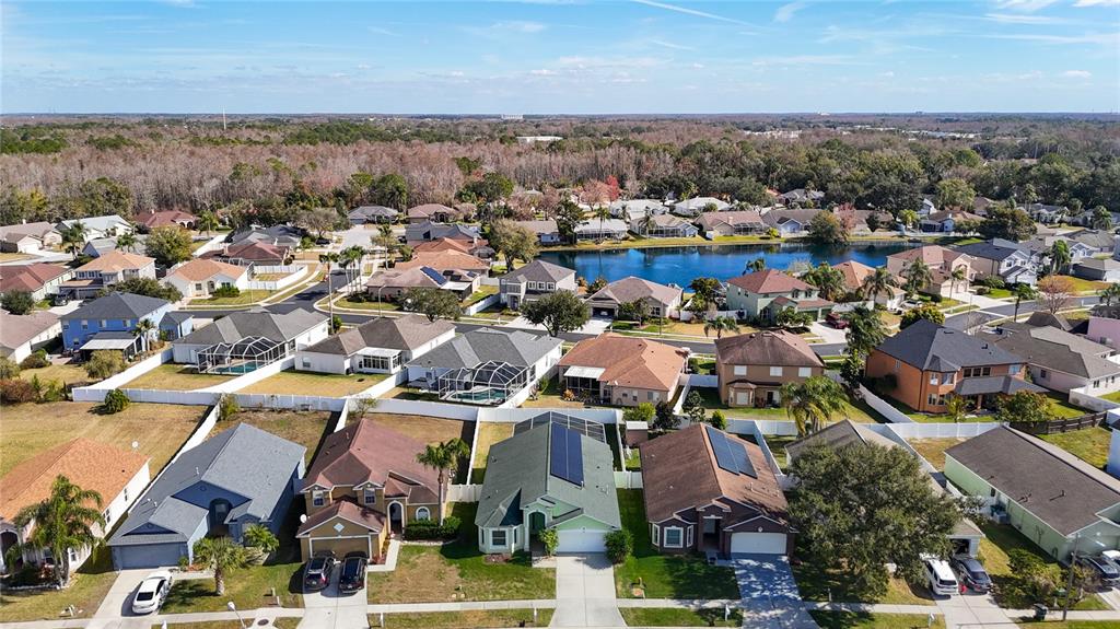 4824 Woodmere Road Land O Lakes, FL 34639 - Photo 8 of 50 an aerial view of a city