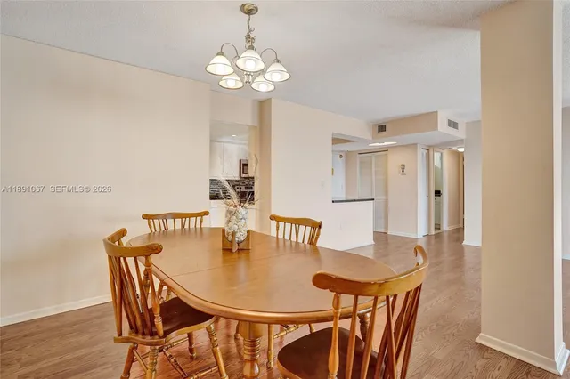 a kitchen with sink and cabinets