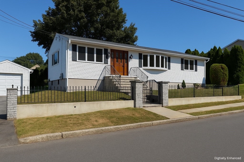 498 Tower Street Fall River, MA 02721 - Photo 1 of 8 a view of a house with a swimming pool and a yard