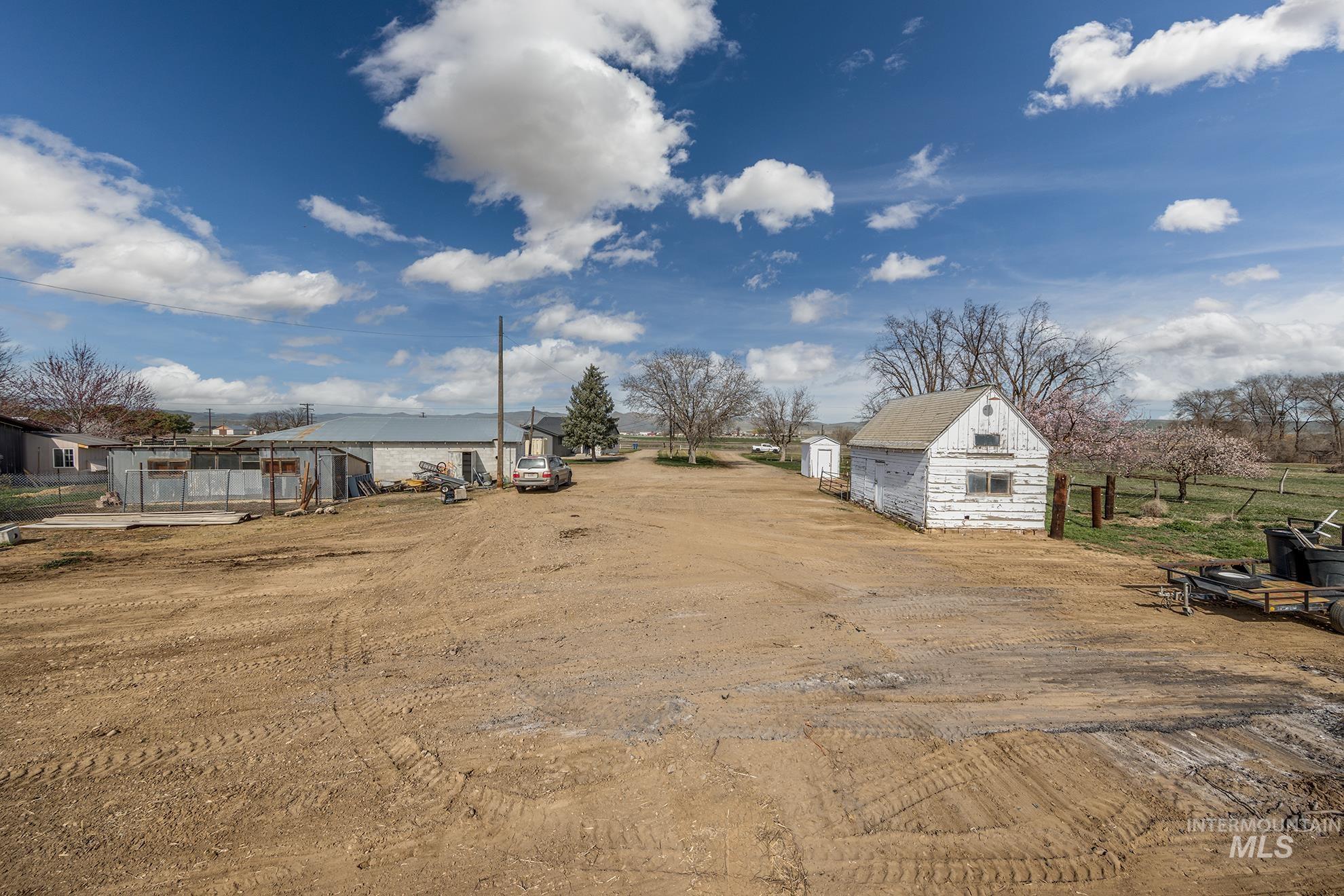 1009 County Road 70 Weiser, ID 83672 - Photo 36 of 48 View of yard featuring an outdoor structure