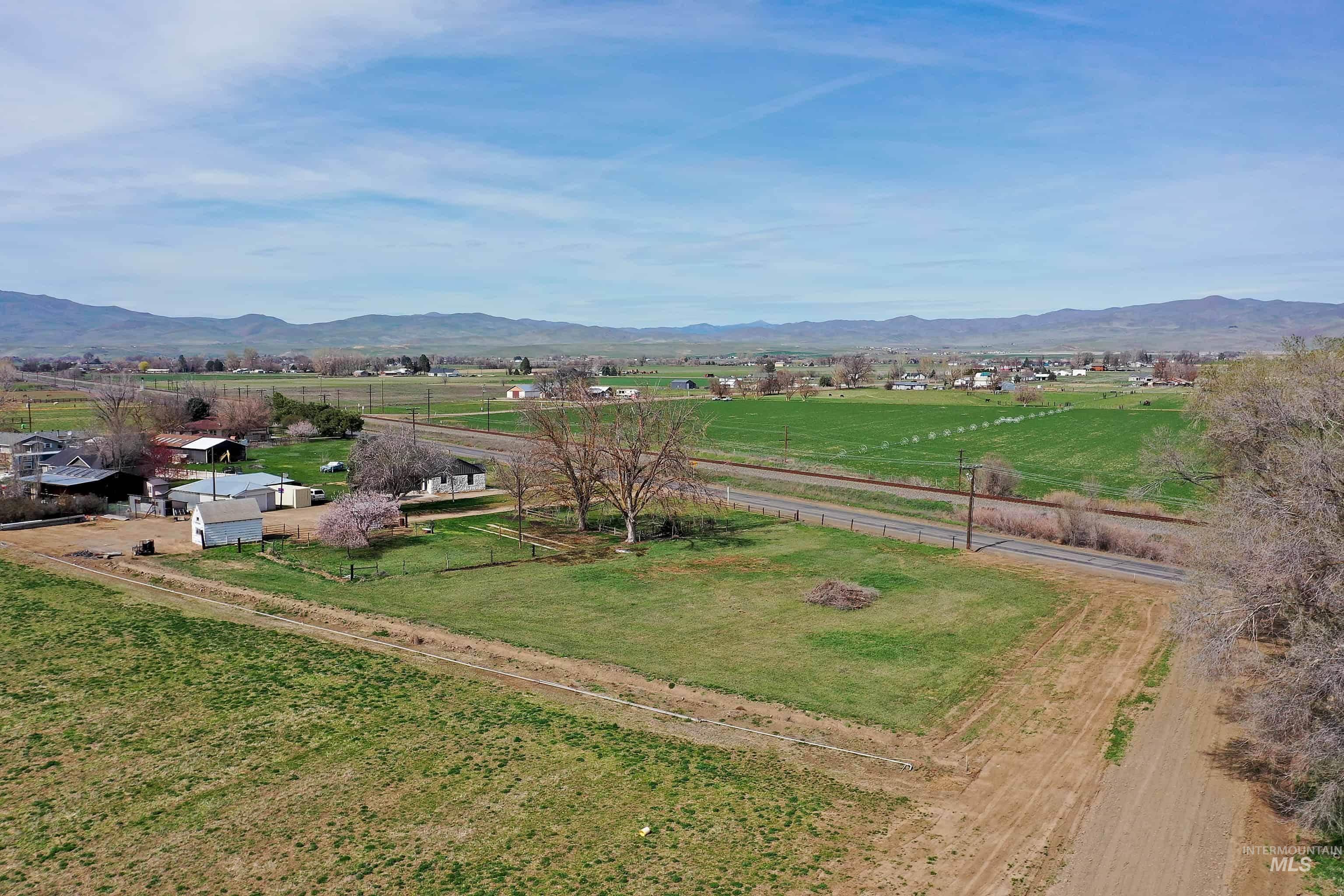 1009 County Road 70 Weiser, ID 83672 - Photo 40 of 48 View of mountain backdrop featuring rural landscape and a pastoral area
