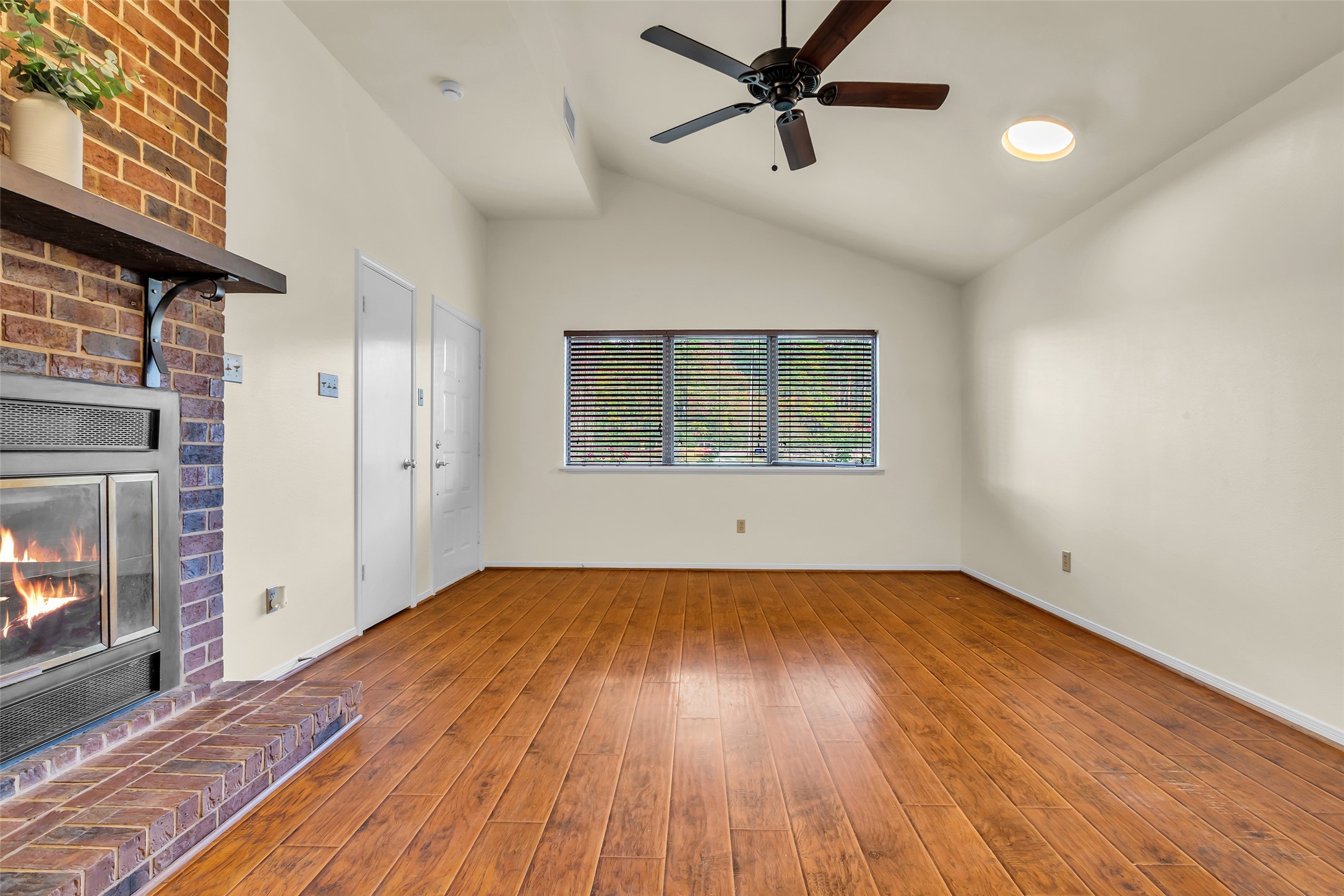 17831 West Fm 1097 Montgomery, TX 77356 - Photo 16 of 28 a view of empty room with wooden floor and fan