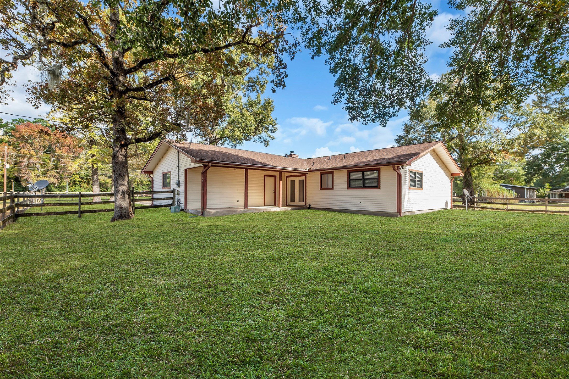 17831 West Fm 1097 Montgomery, TX 77356 - Photo 26 of 28 a view of a house with a backyard