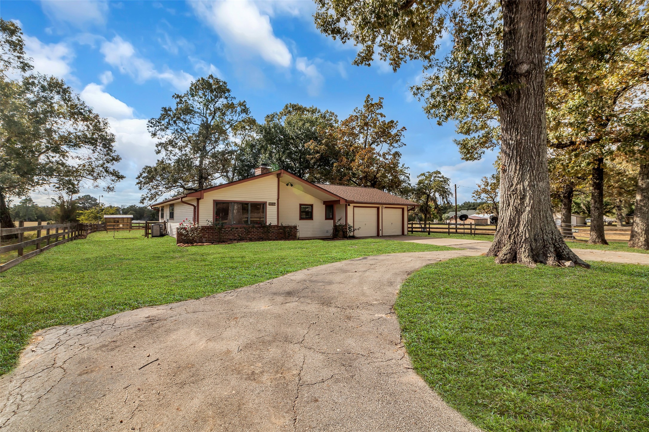17831 West Fm 1097 Montgomery, TX 77356 - Photo 3 of 28 a front view of house with yard and green space