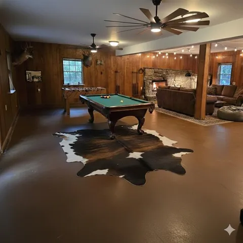 a living room with patio furniture and a chandelier