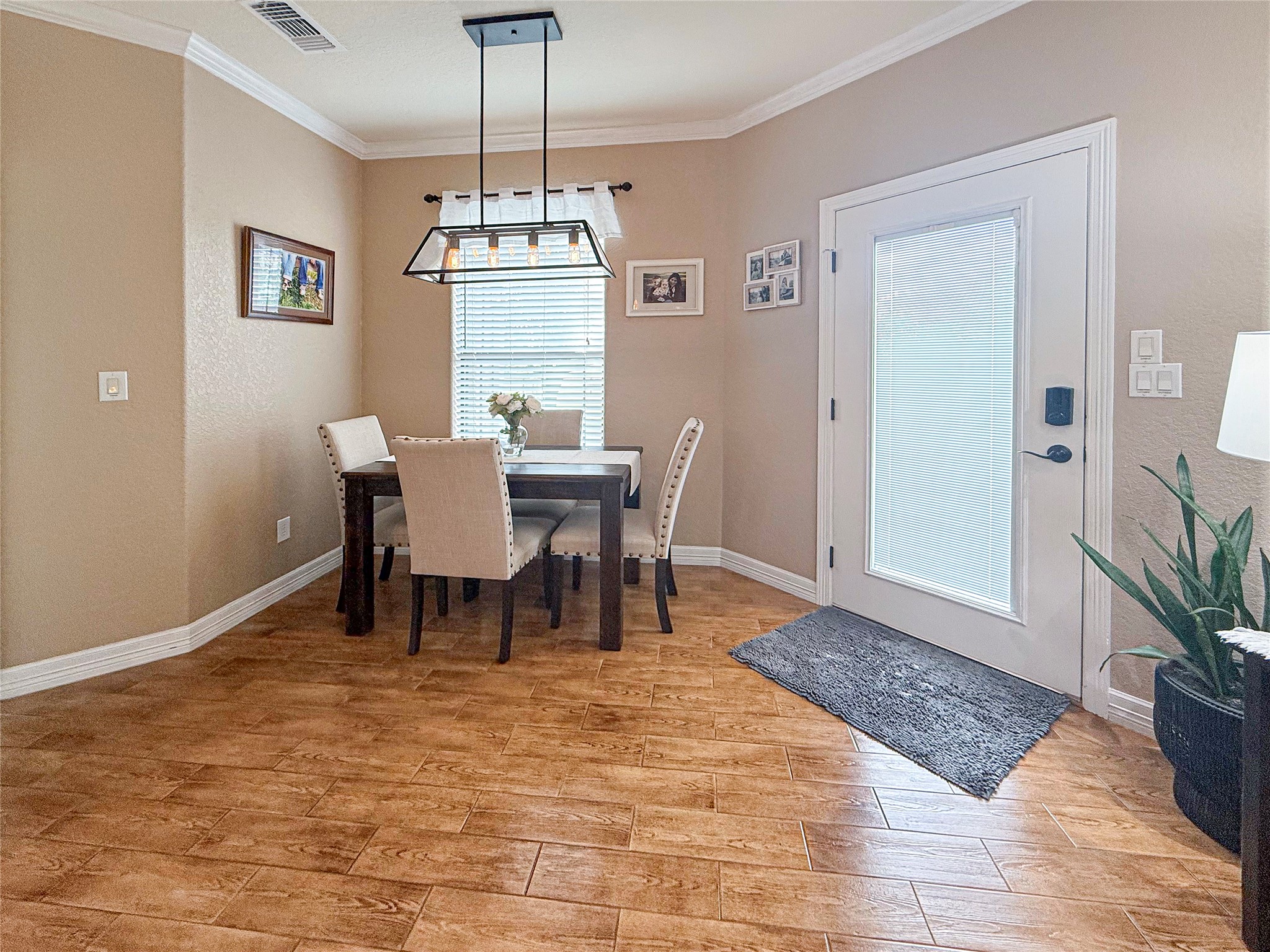 807 Mill Road Angleton, TX 77515 - Photo 20 of 46 Bright breakfast area with peaceful backyard and pool views.