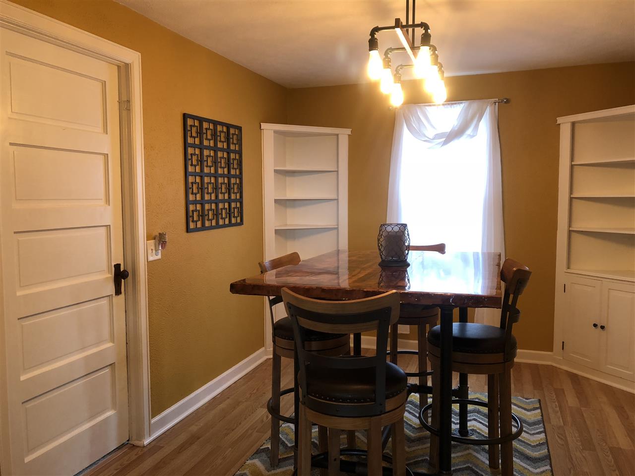 4502 Klinger Road Leaf River, IL 61047 - Photo 10 of 25 a view of a dining room with furniture and window