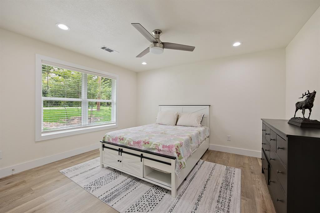 114 Ricky Road Gun Barrel City, TX 75156 - Photo 14 of 18 Bright interior featuring wood-finish flooring, recessed lighting, and a contemporary ceiling fan