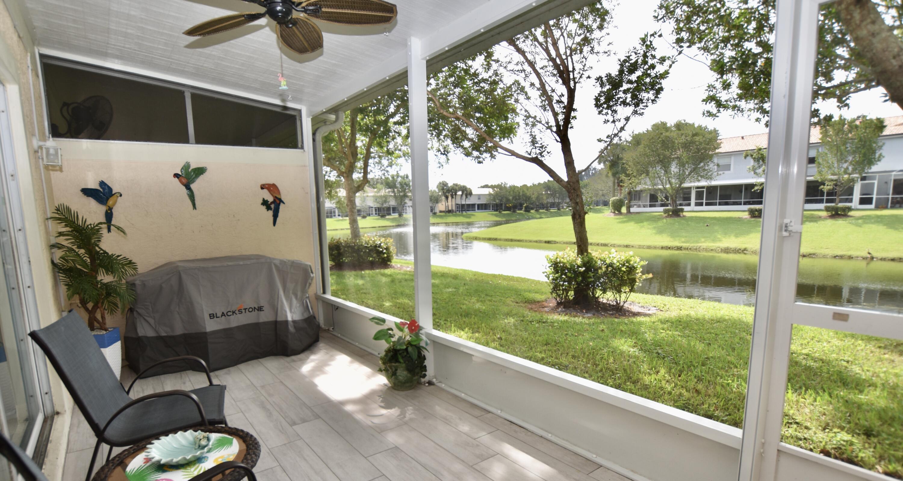318 Timberwalk Trail Jupiter, FL 33458 - Photo 8 of 33 Back Patio w/ lake view