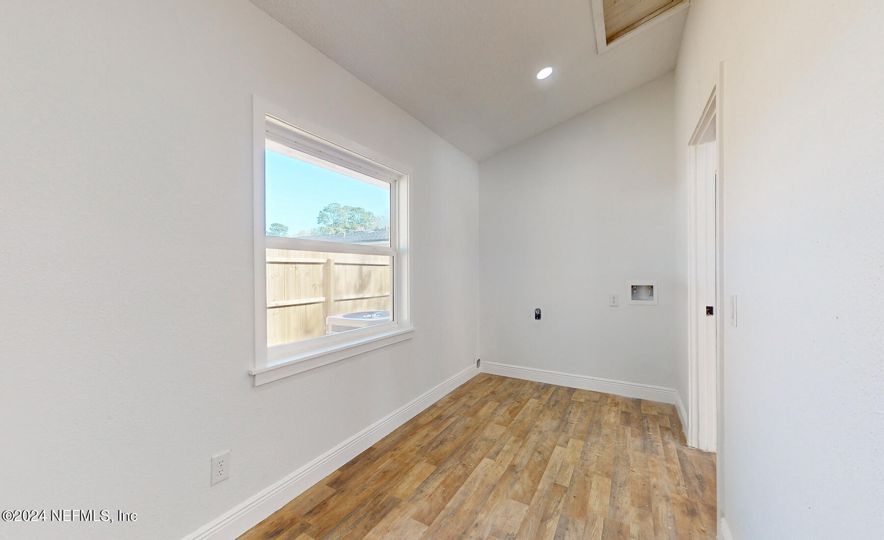 2136 Azore Court Jacksonville, FL 32216 - Photo 27 of 36 a view of empty room with wooden floor and fan