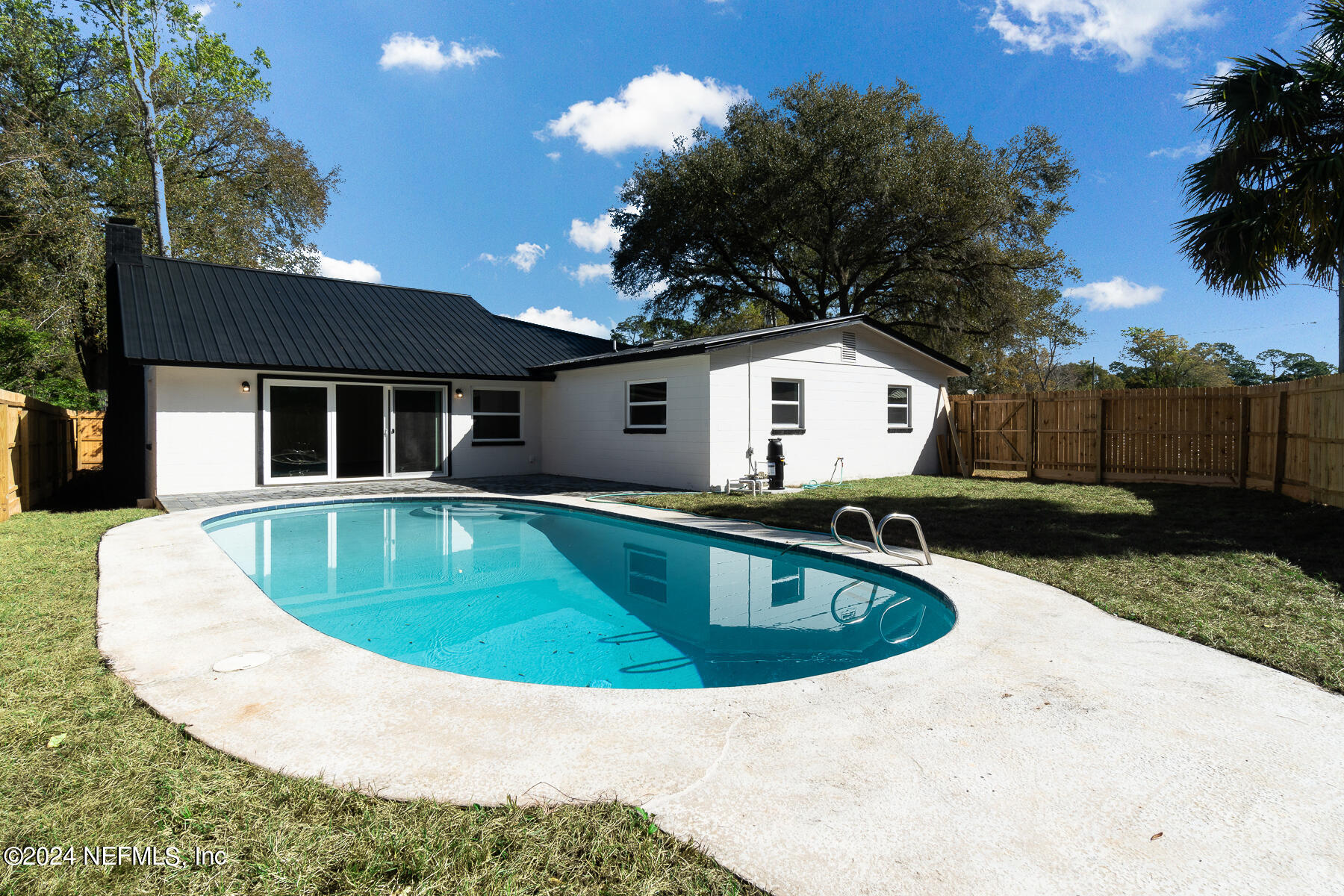 2136 Azore Court Jacksonville, FL 32216 - Photo 32 of 36 a view of outdoor space yard swimming pool and patio