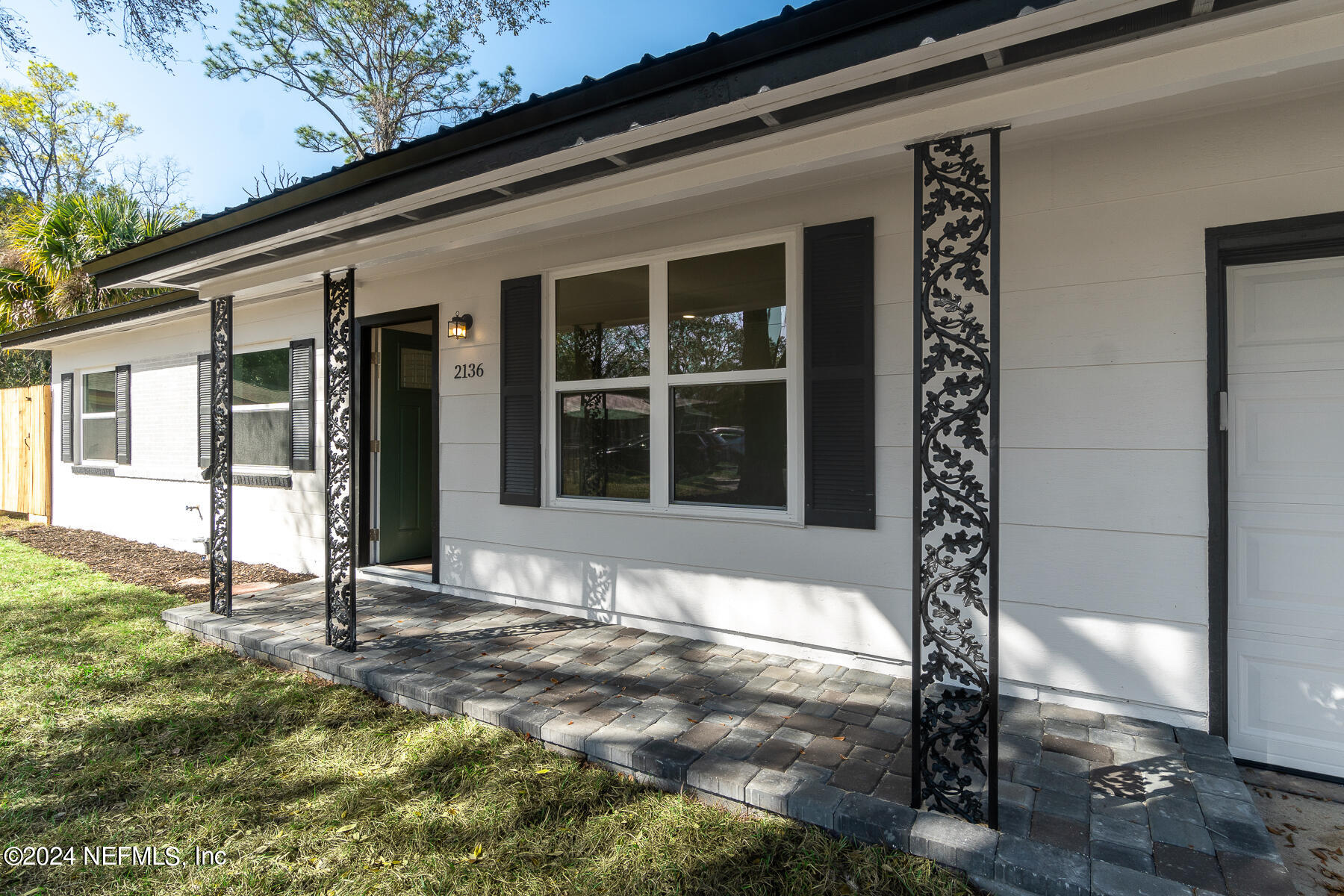 2136 Azore Court Jacksonville, FL 32216 - Photo 5 of 36 a front view of a house with a porch