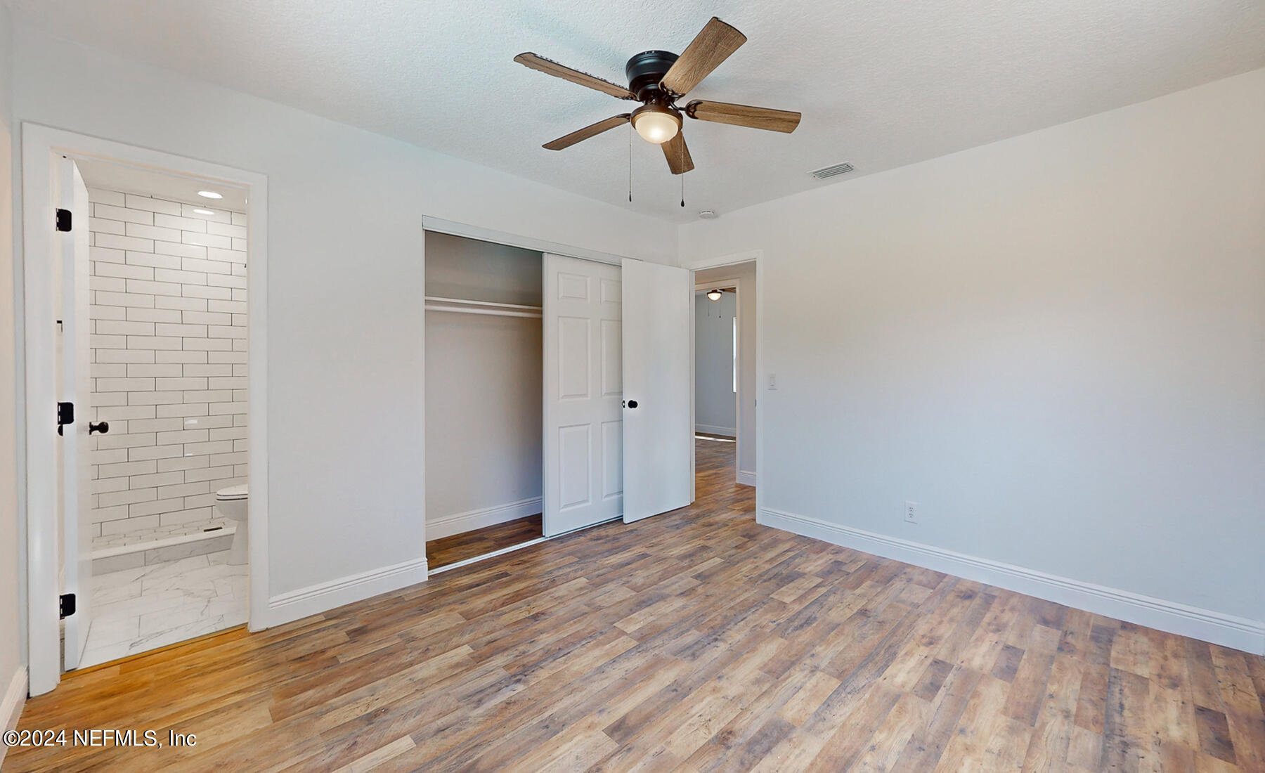 2136 Azore Court Jacksonville, FL 32216 - Photo 8 of 36 a view of a room with a ceiling fan