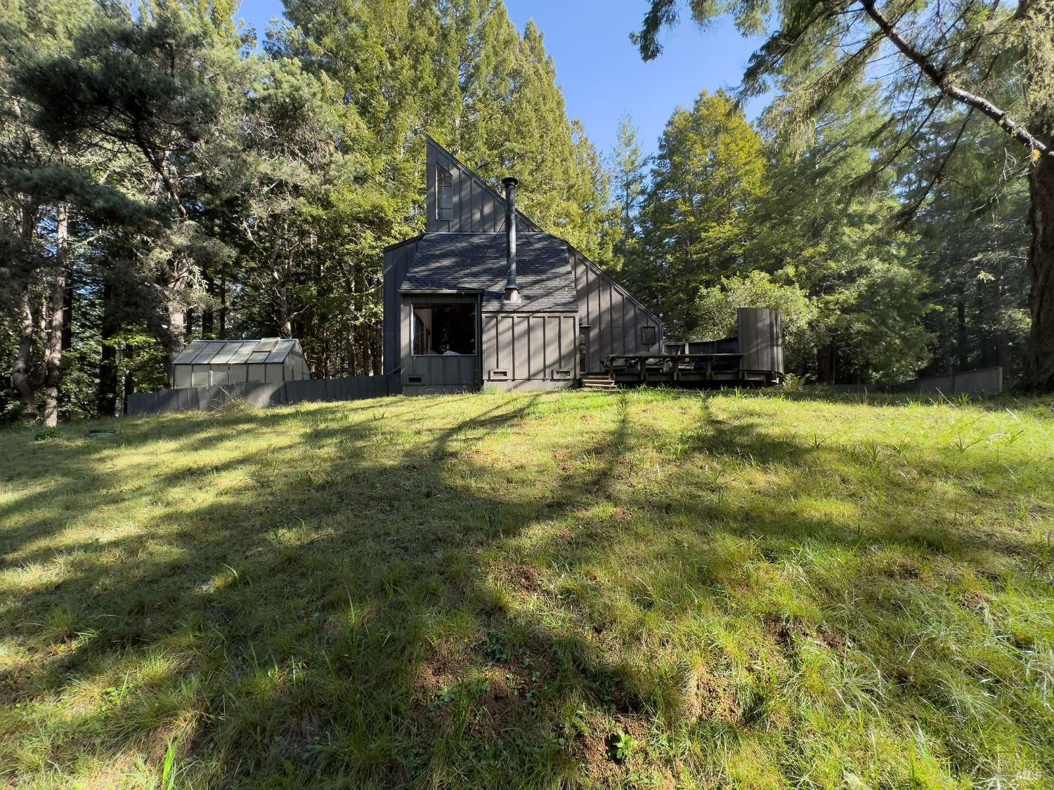 475 Drovers Close The Sea Ranch, CA 95497 - Photo 1 of 1 a view of a house with a yard