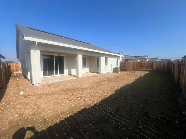 a view of an outdoor space kitchen