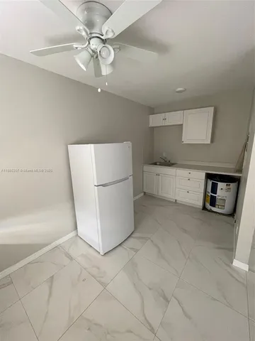 a view of a storage & utility room with washer and dryer