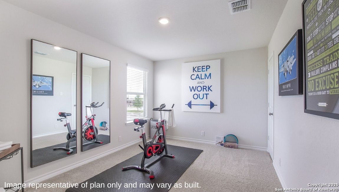 14705 Crosby Rusk San Antonio, TX 78245 - Photo 17 of 29 a view of a room with gym equipment