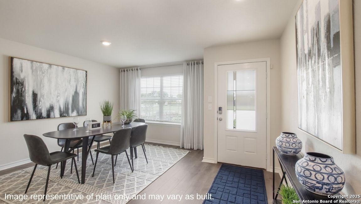 14705 Crosby Rusk San Antonio, TX 78245 - Photo 3 of 29 a view of a dining room with furniture window and outside view