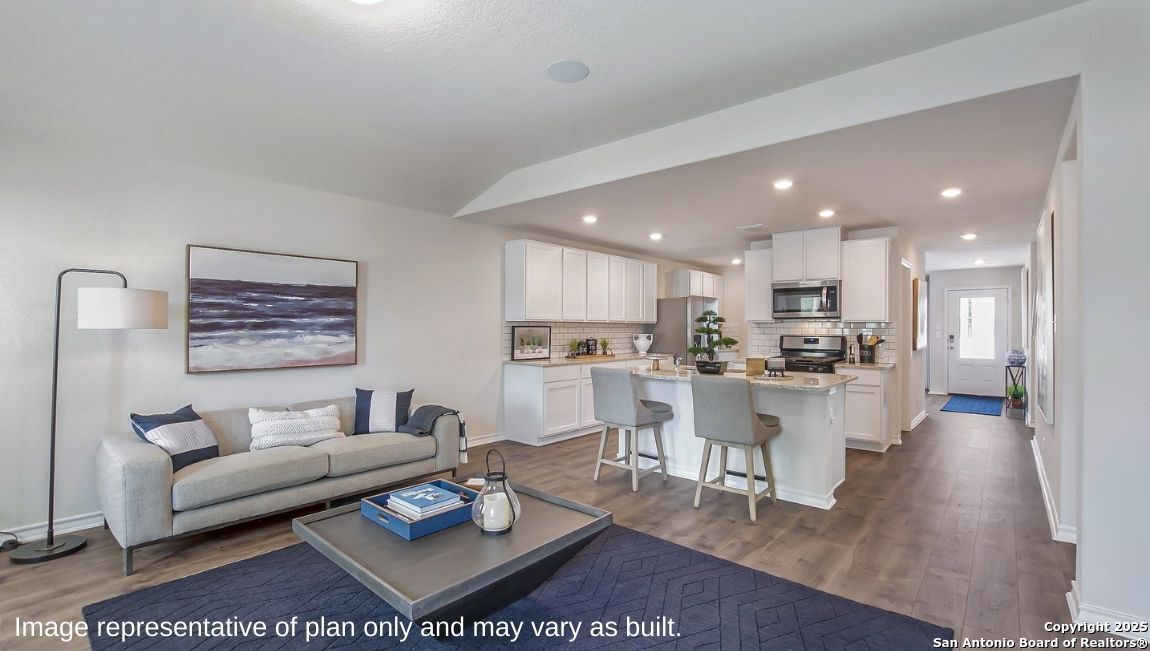 14705 Crosby Rusk San Antonio, TX 78245 - Photo 8 of 29 a living room with furniture and kitchen view