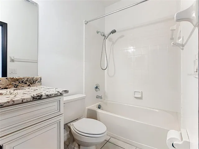 a bathroom with a bath tub