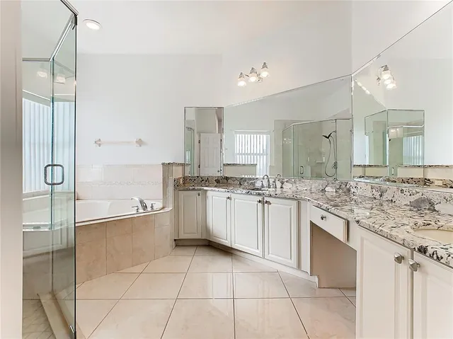 a view of an empty room with windows