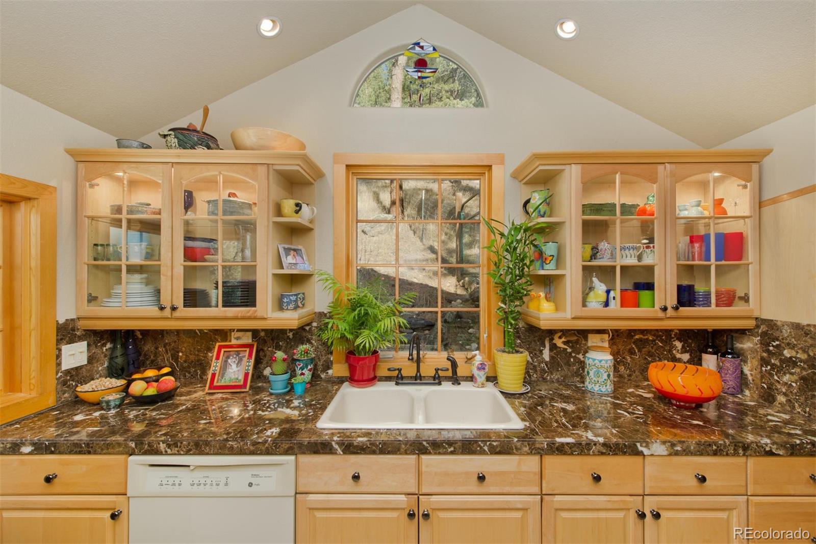 3010 Kerr Gulch Road Evergreen, CO 80439 - Photo 10 of 32 a kitchen with sink and cabinets