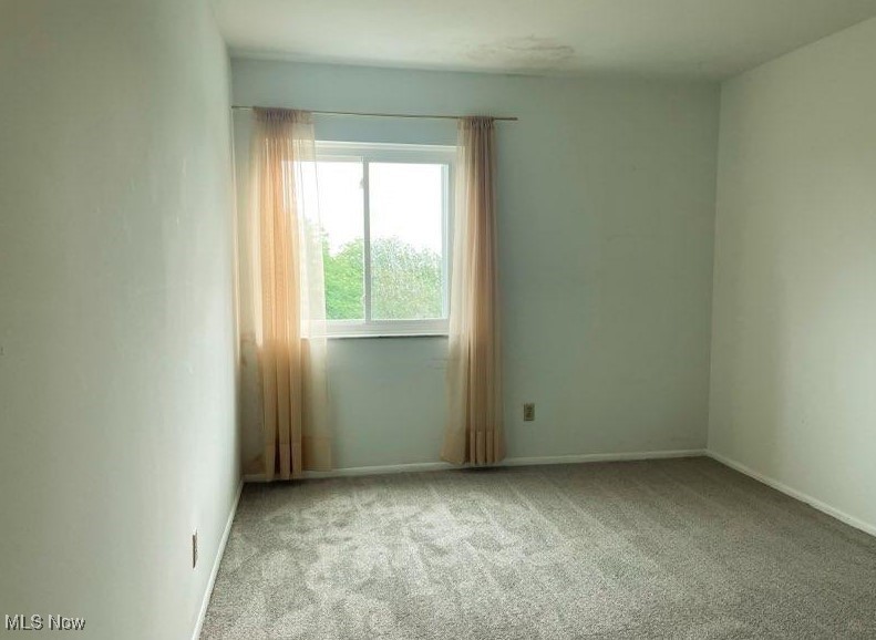 20333 Detroit Road, Unit 510B Rocky River, OH 44116 - Photo 6 of 9 Unfurnished room with light carpet