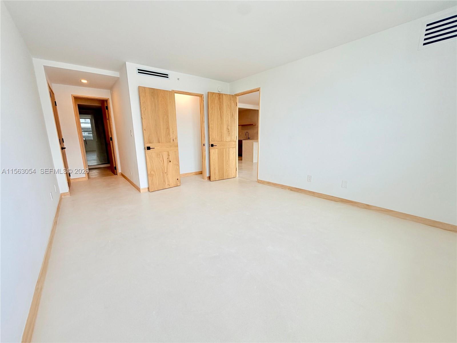 100 Lincoln Road, Unit 1241 Miami Beach, FL 33139 - Photo 12 of 18 a view of an empty room with a window